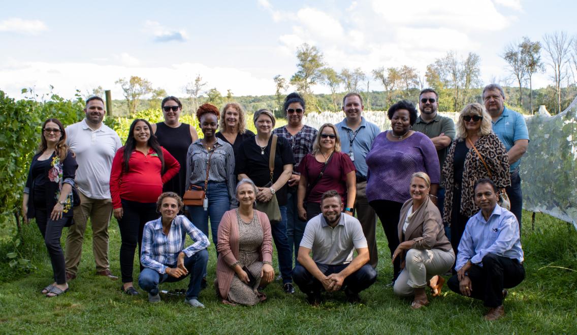 New Jersey Rural Development team poses for a photo in September of 2023 in Ringoes, NJ, at the Unionville Vineyards field.