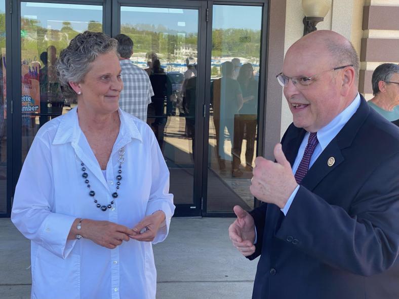  State Director Bob Morgan (right) discusses Rural Development programs with Pam Bailor, director, at the ribbon cutting ceremony for a new mental health service center in Uniontown, Pa. The facility, funded through our essential community facilities program, gives locals in need of care a place to meet with qualified professionals from the Fayette County Mental Health Association.