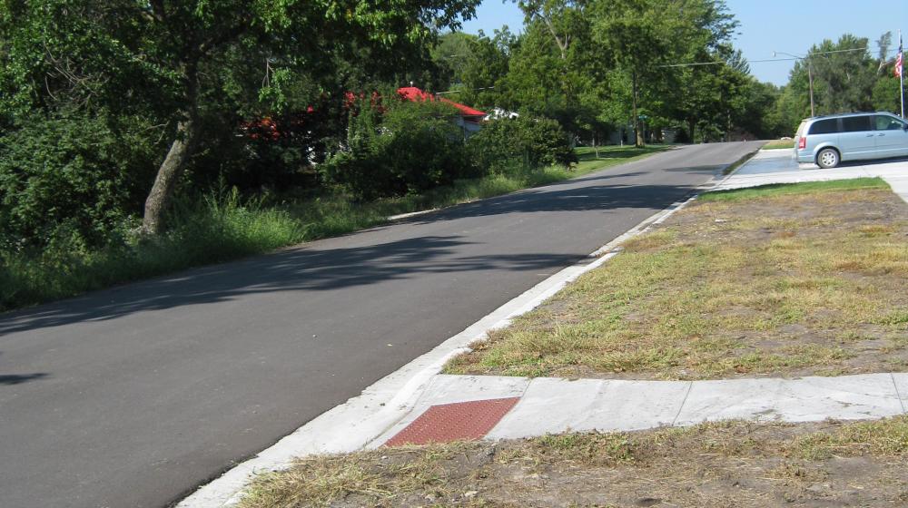 New  streets, curbs and drainage.