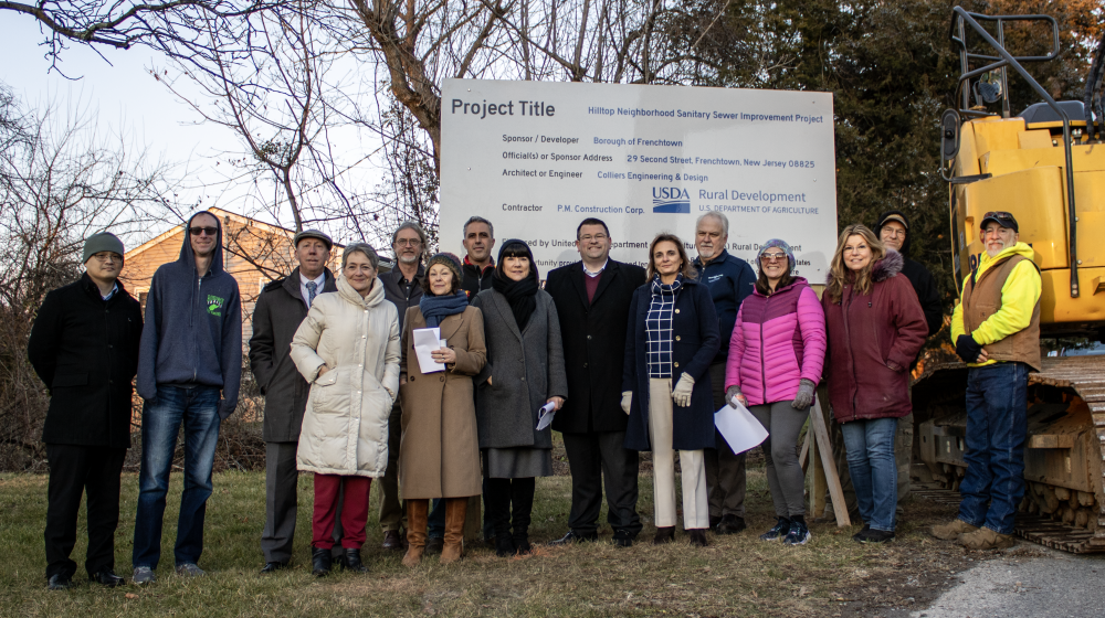 Group photo of Frenchtown, NJ, community with RD NJ staff at a groundbreaking event.