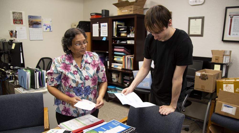 Vinita Domier, Officer Manger for California Center for Cooperative Development, goes over Co-op education material.