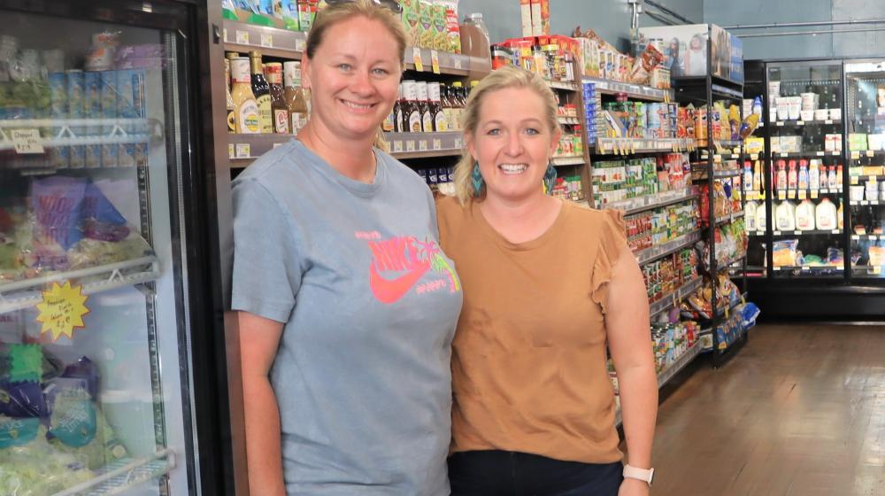 Jen Young and Jessica Heesacker show off the Farm to Family Coop in Hay Springs, Nebraska