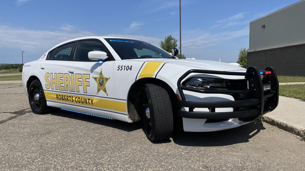 Roberts County patrol cruiser parked outside Sheriff's Department.