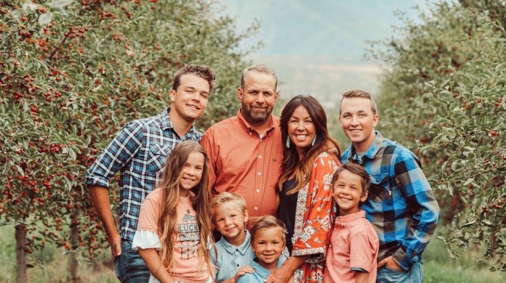 Chris Wall and his family in their cherry orchard