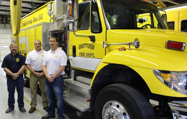 [From left to right] Grottoes Volunteer Fire Department board members Jeff Morris, Captain CJ Chandler and Assistant Chief Chandler Hardy pictured in front of fire protection equipment purchased with the help of a $50,000 USDA Rural Development grant.