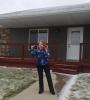 Crystal Dahl in front of her new home.